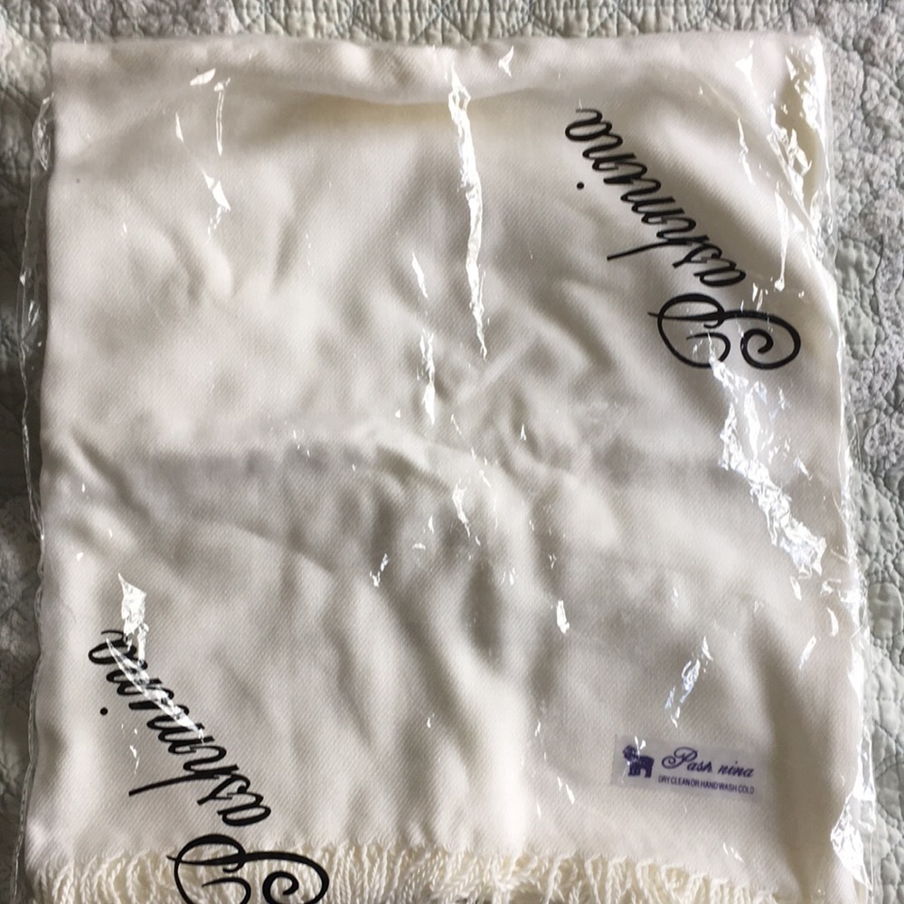 New in package white pashmina scarf.